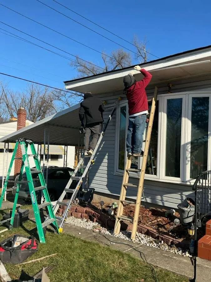 Restoration crew performing exterior repair in Muhlenberg